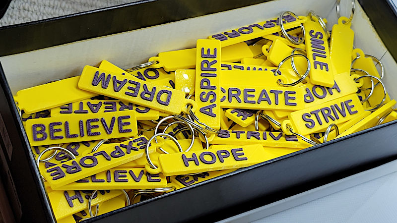 Yellow Ribbon Keychains in a Shoebox