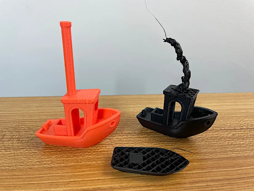 Successful and Failed Benchy Test Prints