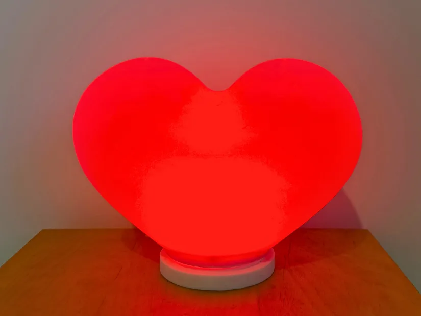 3D printed heart lamp glowing red with LED light for Valentine's Day