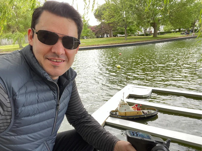 Max Funkner Steering a Model Tugboat