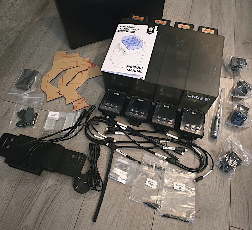 All components included in the EIBOS Series X Tetras filament dryer upgrade kit for Bambu Lab AMS, displayed with manual, screens, cables, brackets, and fixings.