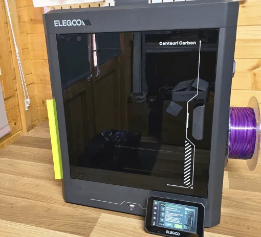 Elegoo Centauri Carbon enclosed CoreXY 3D printer with touchscreen and filament spool