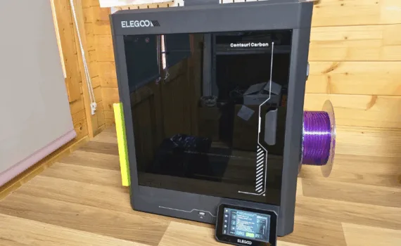 Elegoo Centauri Carbon enclosed CoreXY 3D printer with touchscreen and filament spool