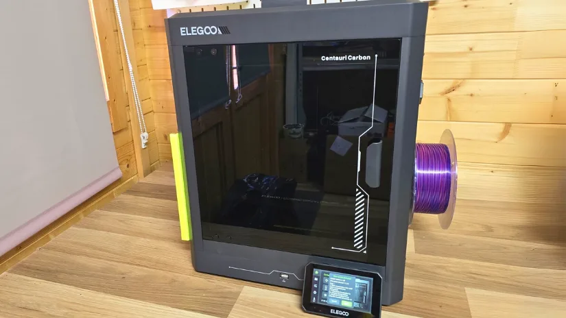 Elegoo Centauri Carbon enclosed CoreXY 3D printer with touchscreen and filament spool