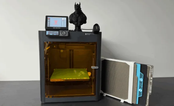 Fully upgraded Bambu Lab P1S 3D printer showing BIGTREETECH addons—including the amber Panda Door, Panda Touch touchscreen, Panda Knomi status display, and a stack of interchangeable Panda build plates—plus a black 3D-printed bust perched on top.