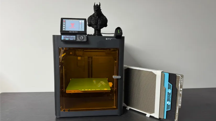 Fully upgraded Bambu Lab P1S 3D printer showing BIGTREETECH addons—including the amber Panda Door, Panda Touch touchscreen, Panda Knomi status display, and a stack of interchangeable Panda build plates—plus a black 3D-printed bust perched on top.