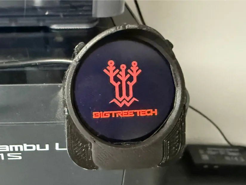 BIGTREETECH Panda Knomi circular status display with glowing red logo, mounted on the front corner of a Bambu Lab P1S Series 3D printer.