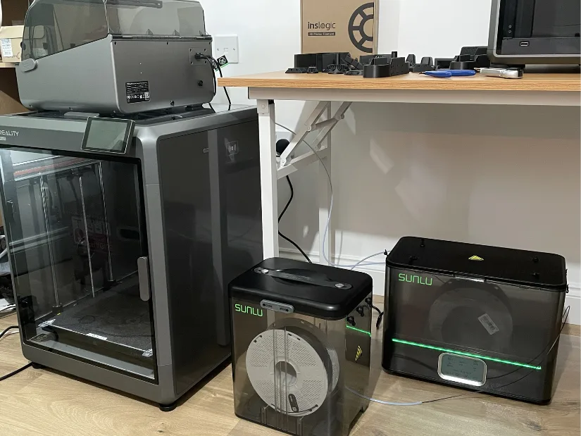 Creality K2 Plus 3D printer with SUNLU E2 (on the right) filament dryer for engineering-grade materials