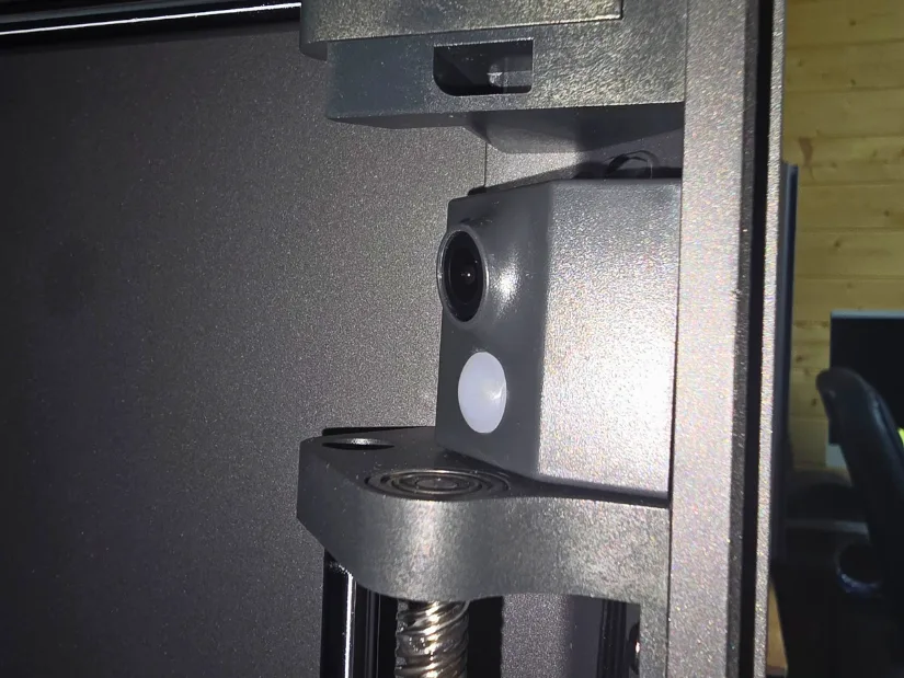 Close-up of the built-in camera and LED light inside the Elegoo Centauri Carbon 3D printer