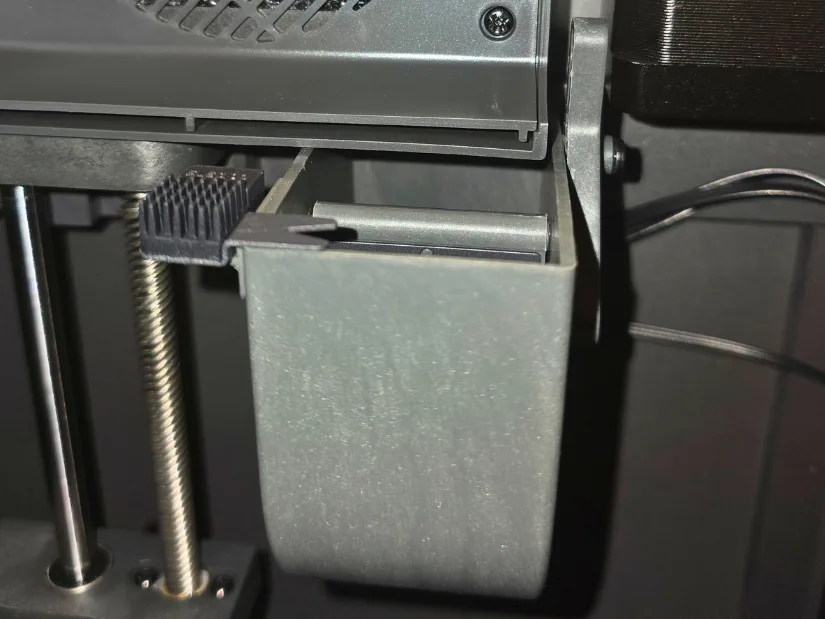 Filament waste chute and nozzle wiper on the Elegoo Centauri Carbon 3D printer 