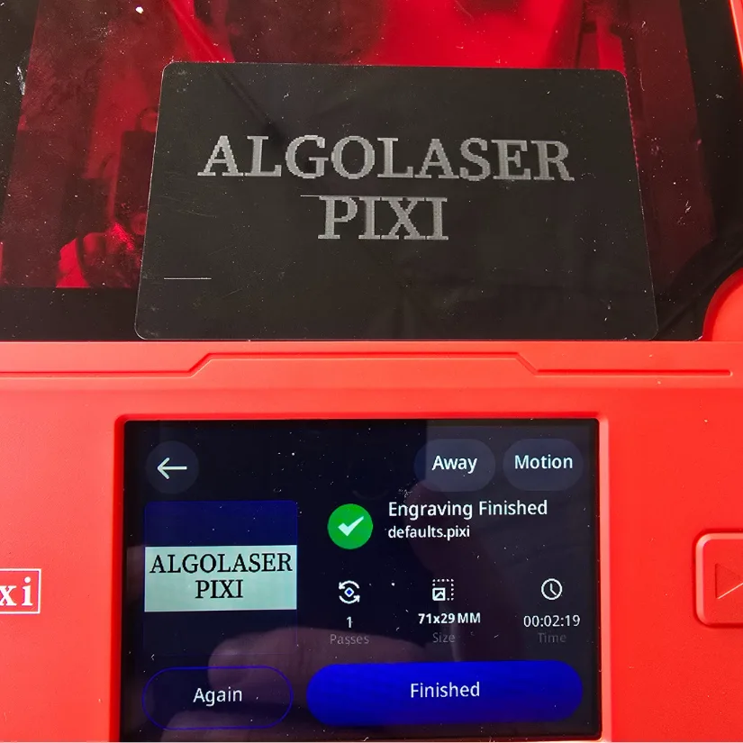 Algolaser Pixi engraved aluminum card with text reading ALGOLASER PIXI and completed engraving shown on screen