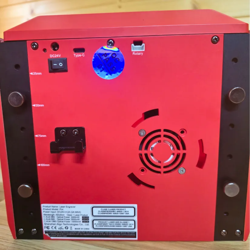 Rear panel of the Algolaser Pixi showing fixtures and fixture holes, rotary port, USB-C, and ventilation fan.