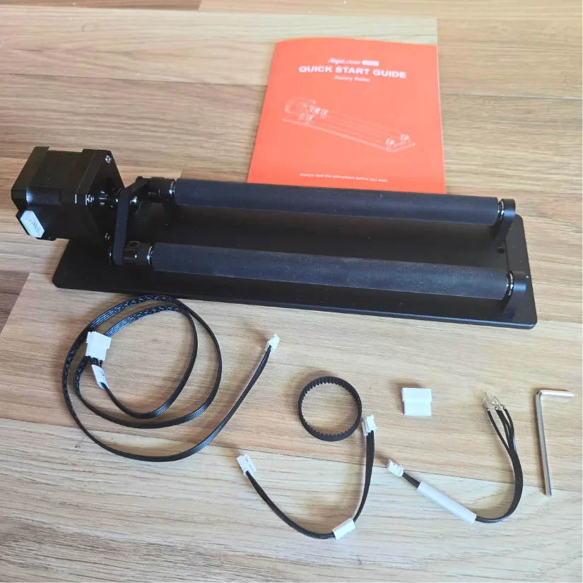 Rotary roller attachment for Algolaser Pixi with cables, belt, connectors, and Quick Start Guide