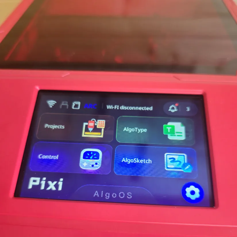 Close-up of the Algolaser Pixi touchscreen displaying AlgoOS with options for Projects, AlgoType, Control, and AlgoSketch