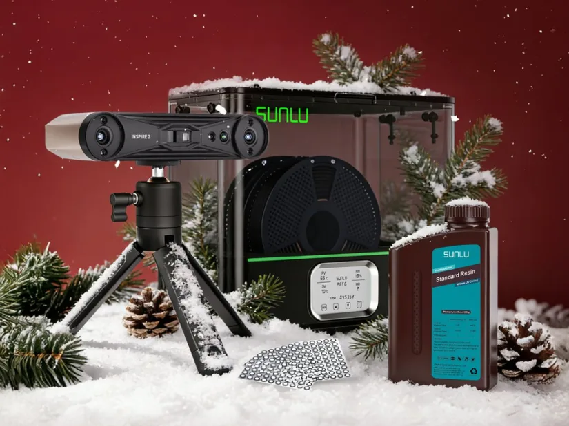 Revopoint Inspire 2 3D scanner, SUNLU filament dryer, resin bottle, and marker dots in a festive snowy Christmas setting, part of 2025 holiday giveaway.