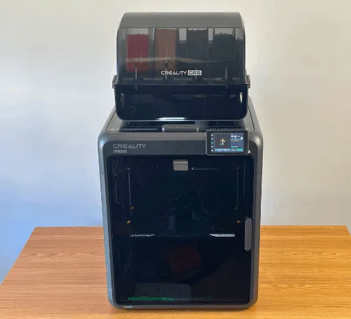 Creality K2 Pro 3D printer with CFS unit placed on a wooden desk