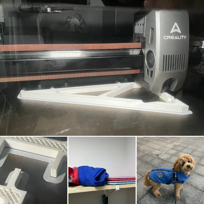 PC-ABS shelf brackets printed on the Creality K2 Pro, close-up details, installed under a shelf holding folded dog clothes, and Teddy the Maltipoo wearing a blue coat.