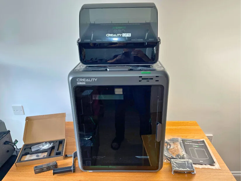 Creality K2 Pro 3D Printer with CFS unit unboxed on table with accessories