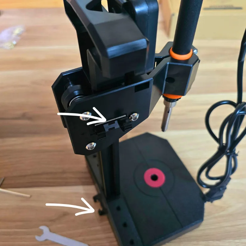 Attaching cable clips to the Mintion Heat Press with double-sided tape