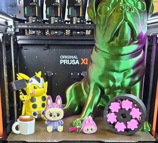 Prusa XL 5-tools and test models including Pikachu Avengers, Pug Statue, and Cogwheel