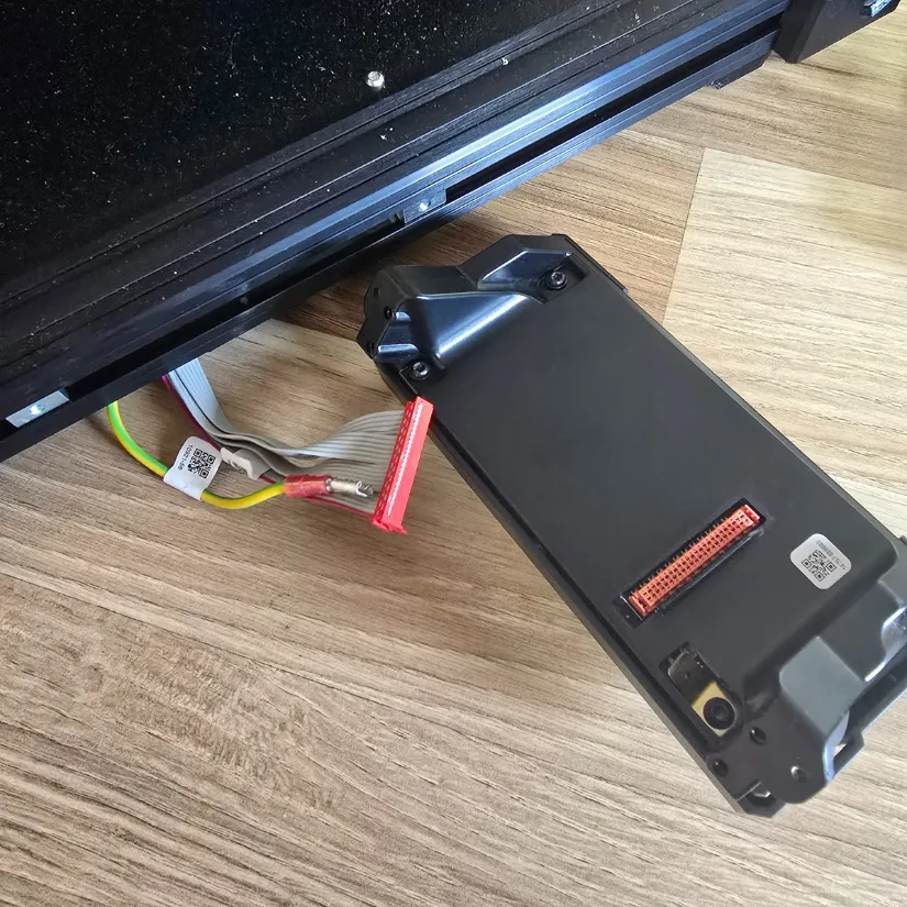 Prusa XL xLCD screen installation showing ribbon cable and grounding wire connection during assembly