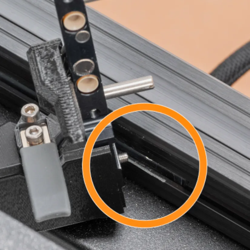 Locate the Protruding Screw