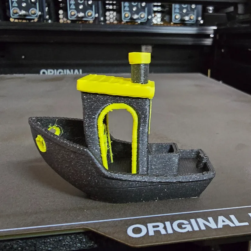 Multi-color Benchy 3D print in black and yellow on the Prusa XL using two toolheads