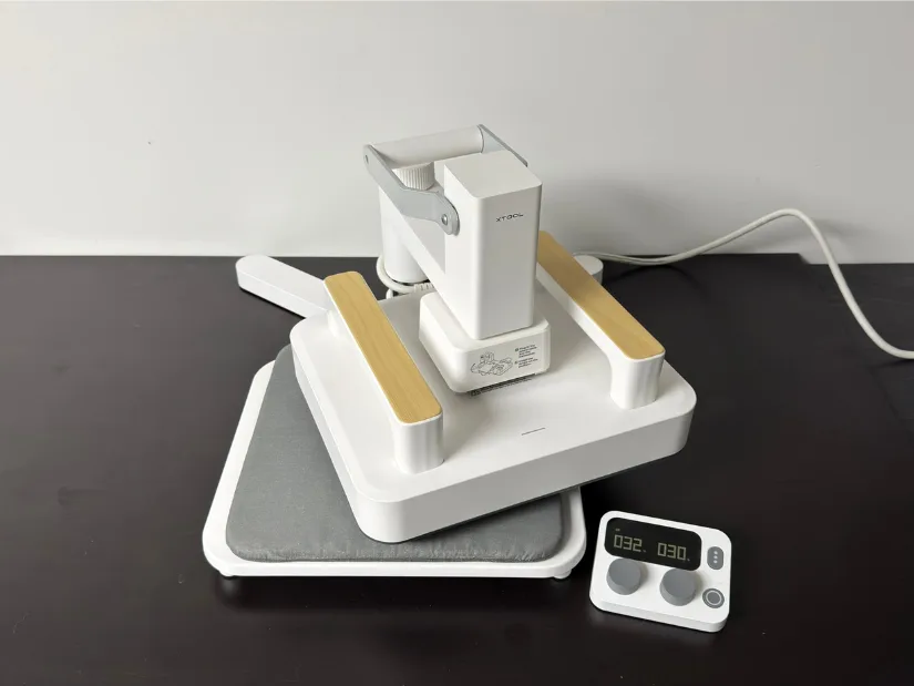 xTool Smart Heat Press mounted on the Smart Press Stand with pressing mat underneath and the separate temperature/time controller on the right.