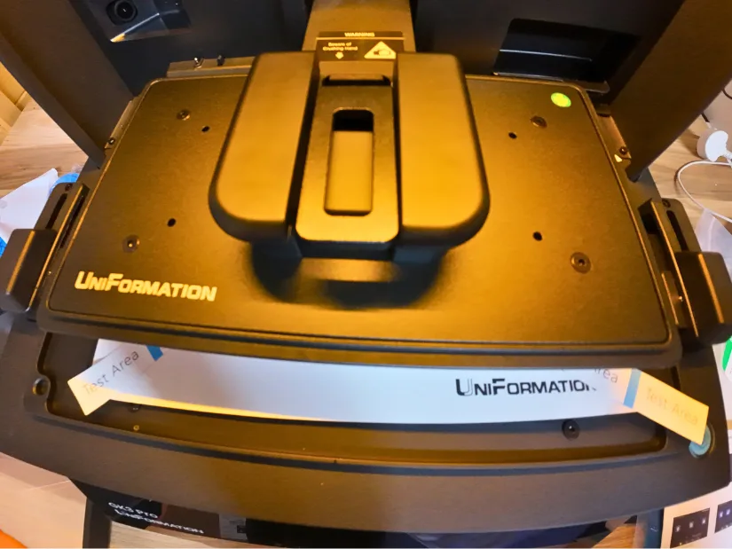 Uniformation GK3 Pro build plate during the levelling and calibration process with test sheet