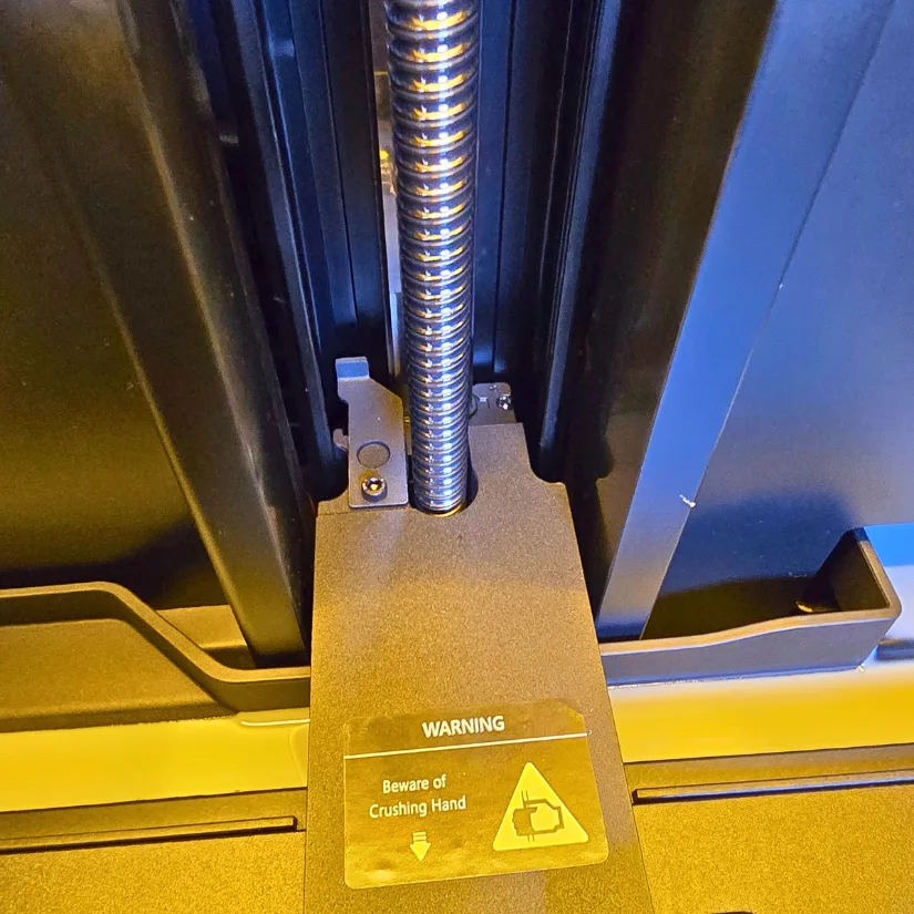 Close-up of the Uniformation GK3 Pro Z-axis showing the ball screw and linear rail assembly