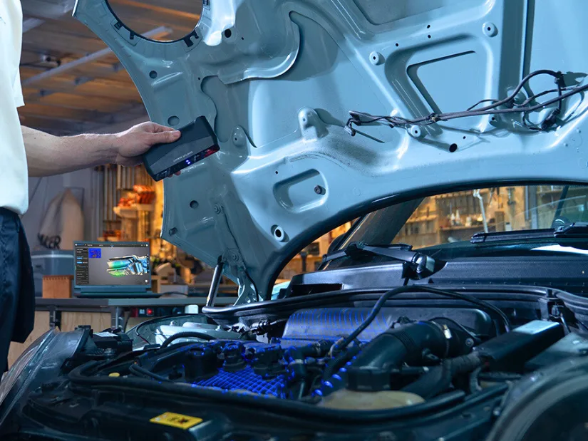 EINSTAR Rockit performing marker-free 3D scanning of automotive engine bay components