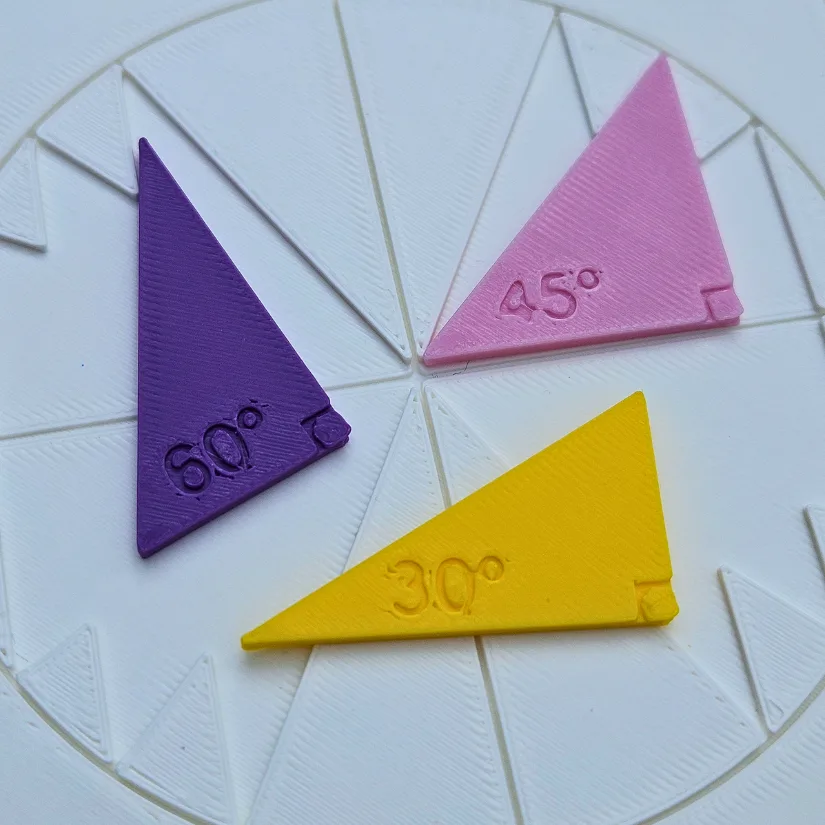 3D printed unit circle triangles showing special angles such as 30, 45, and 60 degrees arranged on a circular base.