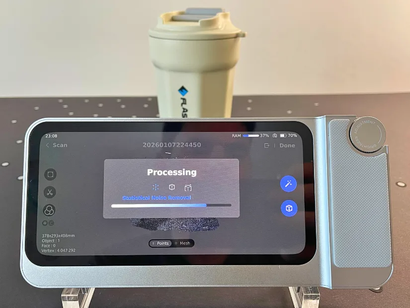 Toucan 3D scanner processing a scan on the device screen using statistical noise removal