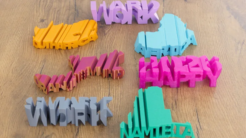 Text-flip 3D print examples including word-to-word and word-to-shape design