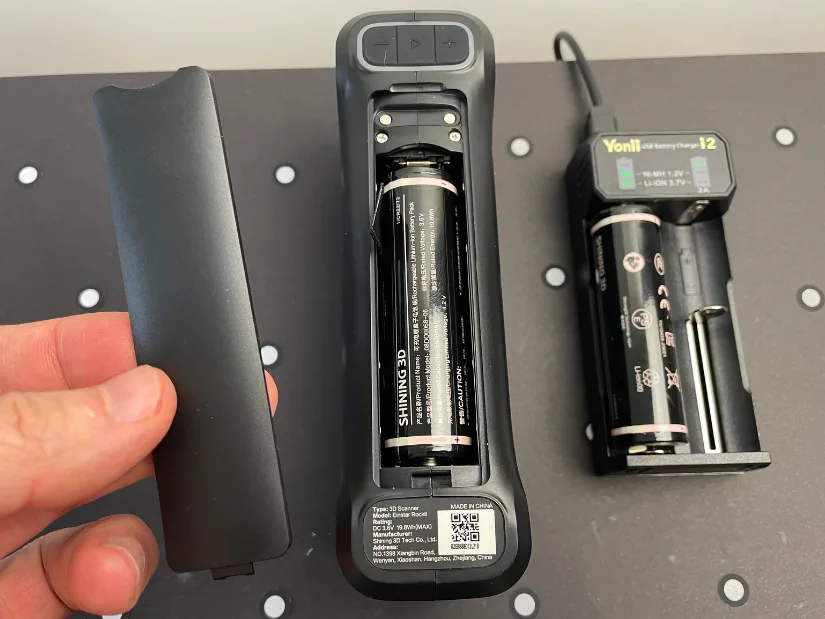 EINSTAR Rockit battery compartment with removable cover and external battery charger