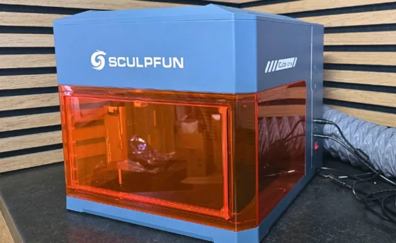 Sculpfun iCube Ultra enclosed laser engraver on a workbench
