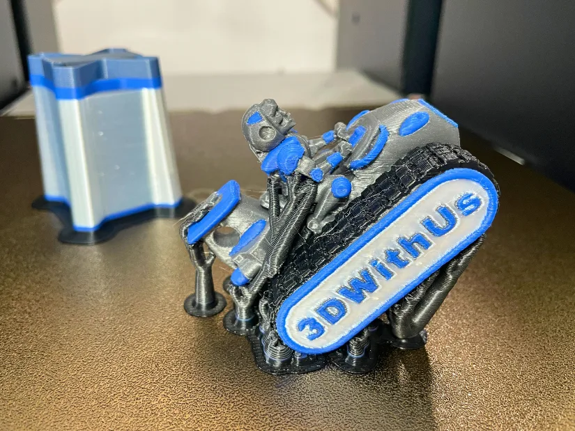 DeathRacer 3D print angled at 45 degrees with supports showing improved detail