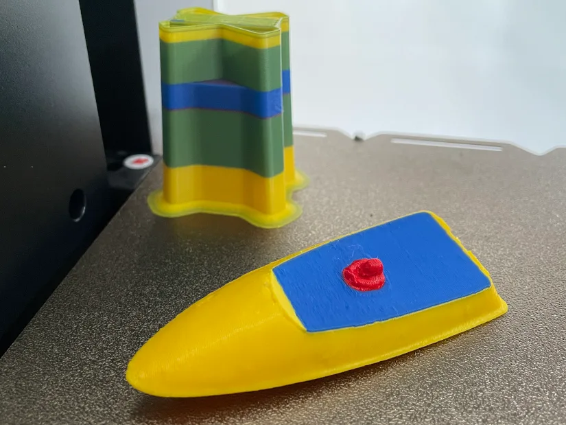 3D printed RC boat prototype miniature with multicolor finish and purge tower