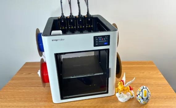 Snapmaker U1 toolchanging 3D printer with multicolor prints and four toolheads installed