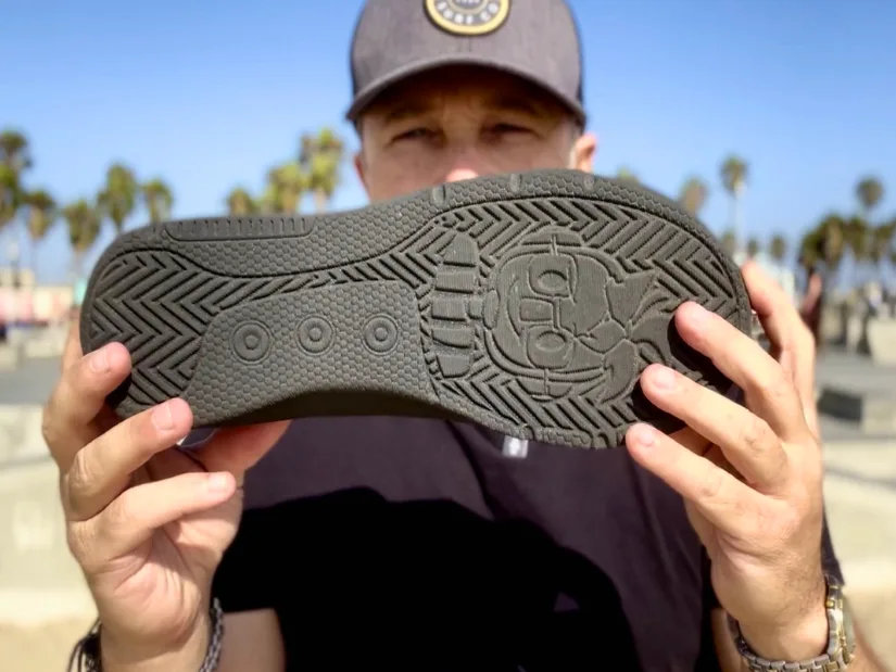 David Tobin holding the customized sole of the limited edition JoelBot D7 3D printed shoe
