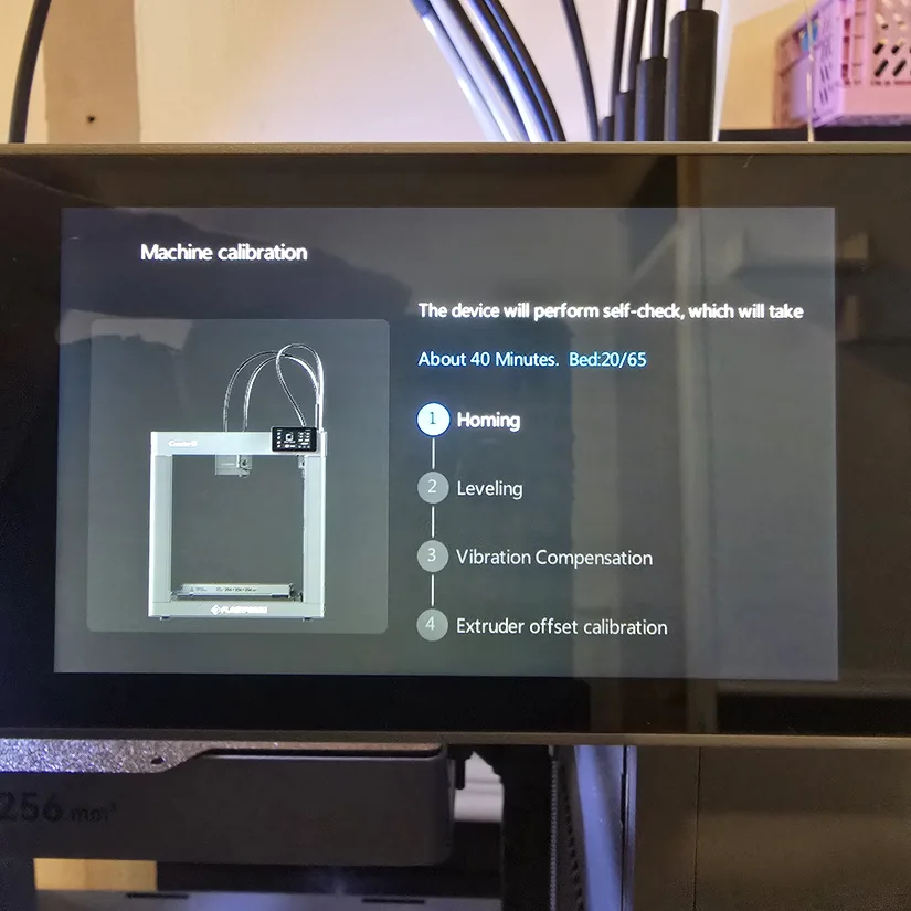 Flashforge Creator 5 device self-check screen Flashforge Creator 5 touchscreen showing the device self-check calibration sequence