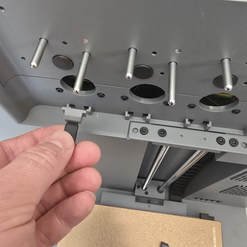 Flashforge Creator 5 nozzle blocker install Flashforge Creator 5 nozzle blocker being installed below the toolhead dock