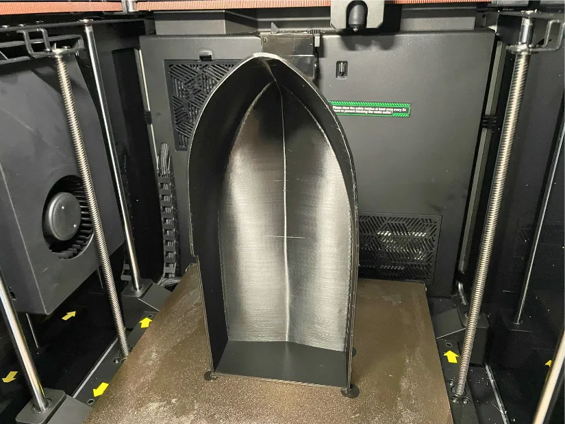 3D printed RC boat hull in black PLA on Creality K2 Pro