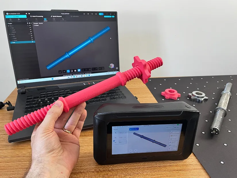 3D printed adjustable dumbbell bar replicated with the Creality Sermoon P1, shown alongside the original metal bar, the scanner, and the digital scan in CrealityScan.