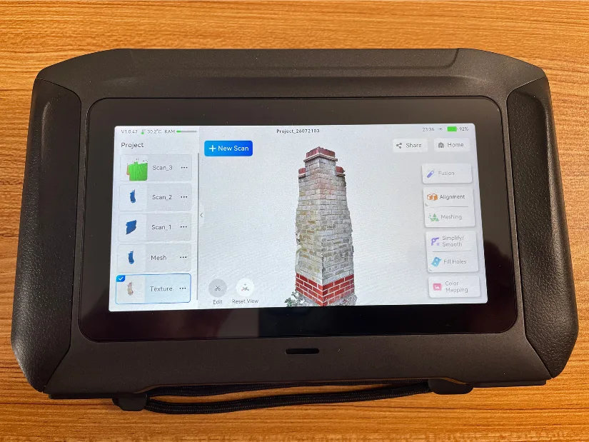 Sermoon P1 displaying a color-mapped 3D model of a brick pillar created in standalone mode after outdoor scanning.