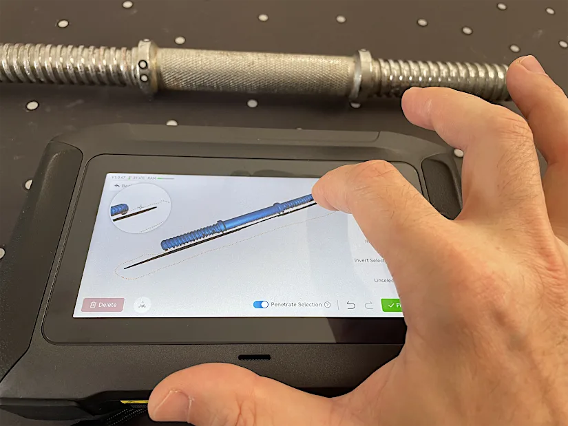 Using the Creality Sermoon P1 touchscreen to clean and trim a scan of a metal dumbbell bar.
