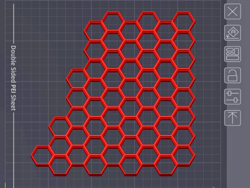 Custom Honeycomb Storage Wall tile generated on a 3D printer build plate