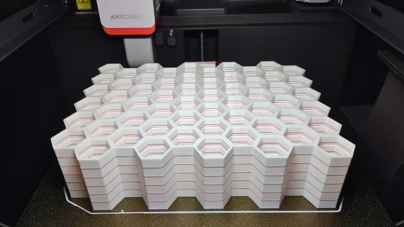 Stackable Honeycomb Storage Wall tiles batch printed on a 3D printer