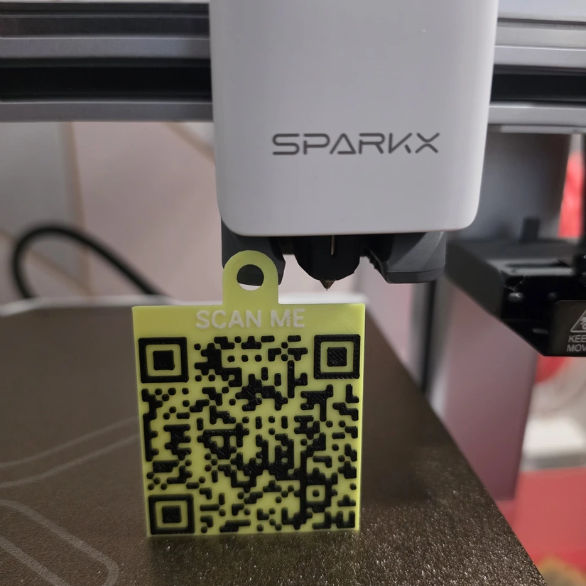 Three-colour QR code keyring printed on Creality SparkX i7 Nano