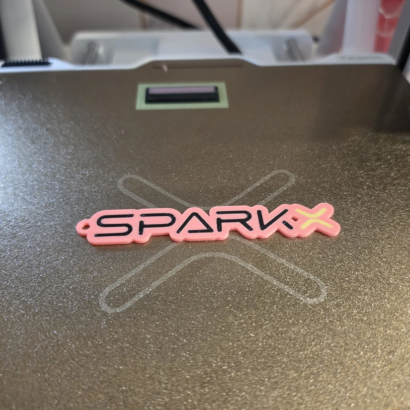 Three-colour SparkX keyring printed on Creality SparkX i7 Nano